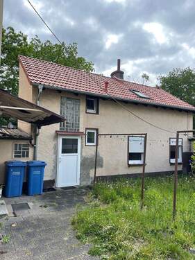 Mehrfamilienhaus mit Anbau - 1 Zimmer Mehrfamilienhaus, Wohnhaus in Hattersheim am Main