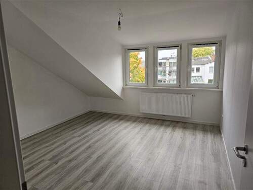 Wohnzimmer Ansicht 2 - 2 Zimmer Etagenwohnung in Bremen