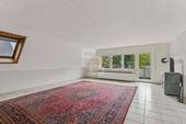 Wohnzimmer mit Balkon OG - 