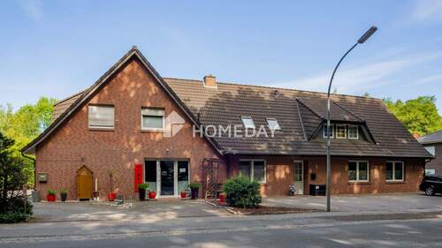 Außenansicht 3 - Mehrfamilienhaus, Wohnhaus mit 326,00 m² in Bippen zum Kaufen