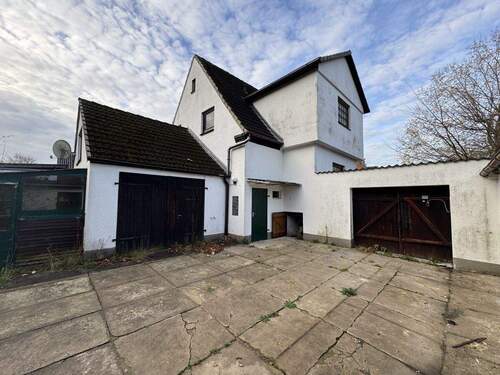 Außenaufnahme - 6 Zimmer Einfamilienhaus zum Kaufen in Kiel / Suchsdorf