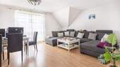 Wohnzimmer - Etagenwohnung mit 64,80 m² in Wedel zum Kaufen
