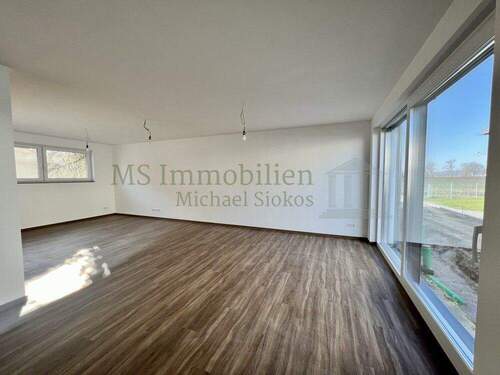 Wohnzimmer - Doppelhaushälfte mit 135,00 m&sup2; in Lampertheim / Hofheim zum Kaufen