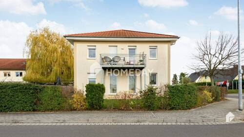 Außenansicht 1 - Gut vermietetes KfW-60-Zweifamilienhaus in Zwenkau - 2 Stellplätze und großzügiges Grundstück