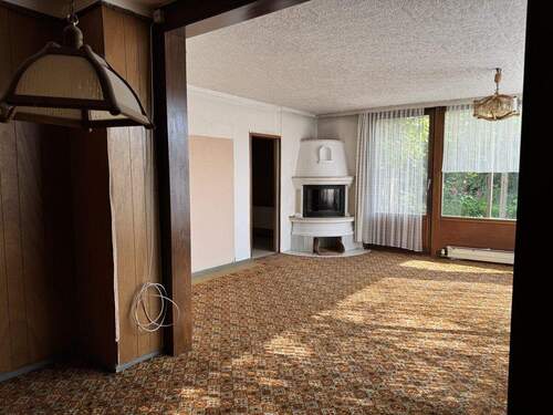 Wohnzimmer - Bungalow mit 99,00 m² in Kiel / Suchsdorf zum Kaufen