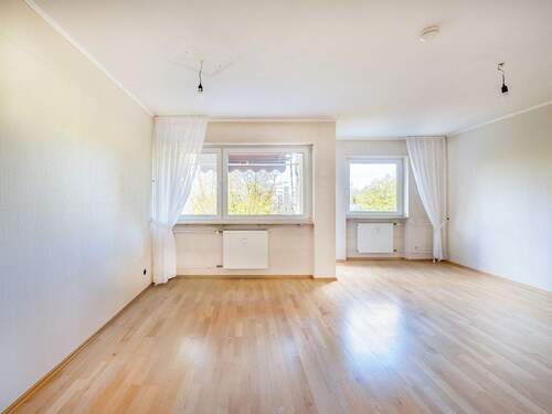 Wohnzimmer Ansicht 1 - 3 Zimmer Etagenwohnung zum Kaufen in Karlsruhe / Nordweststadt