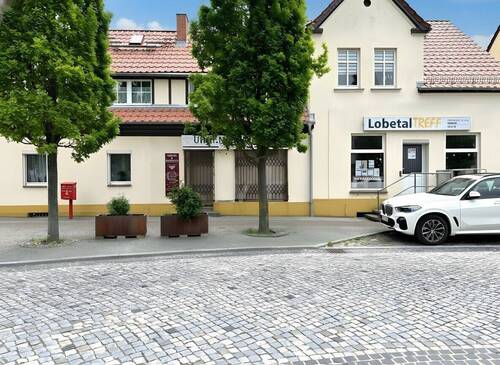 Straßenansicht - 8 Zimmer Mehrfamilienhaus, Wohnhaus zum Kaufen in Werneuchen