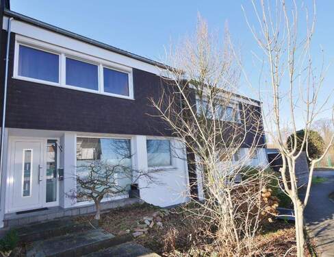 Hausansicht Straße - Attraktives, modernisiertes Reihenhaus in ruhiger und grüner Lage von Haan-Gruiten