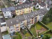 Drohnenaufnahme - Jetzt investieren - Leerstehende Drei-Zimmer-Eigentumswohnung in Osnabrück