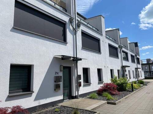 Hausansicht - Ruhig gelegene 3-Zimmerwohnung mit Terrasse im Quartier Süd