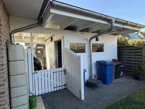 Carport_Eingang zum Garten - Einfamilienhaus mit 122,80 m&sup2; in Wiefelstede zum Kaufen