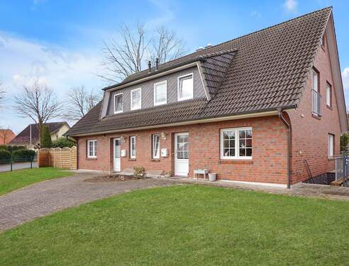 Außenansicht - Ein stilvolles Doppelhaus zum Kauf in Jesteburg! - viel Platz, Garten & Carport!