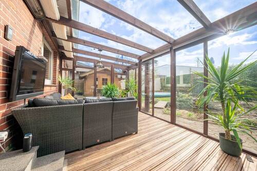 Aus dem Wintergarten können Sie Ihren Garten bewundern - 