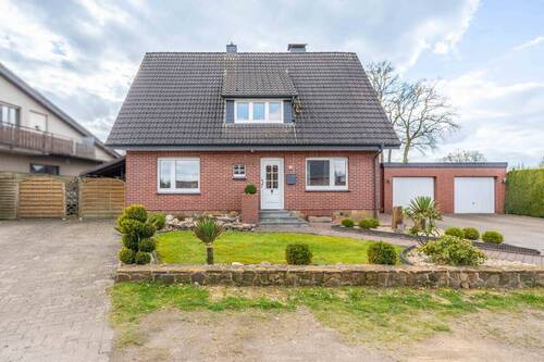 Titelbild - Ein-Zweifamilienhaus in Bramsche mit liebevollem Garten