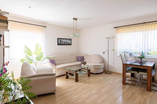 Wohnzimmer - *** EG Wohnung - TERRASSE - GARAGE - VERMIETET - FUßBODENHEIZUNG - BEGEHRTE LAGE ***