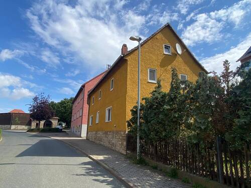 Ansicht Haus - 4 Zimmer Einfamilienhaus zum Kaufen in Saaleplatte