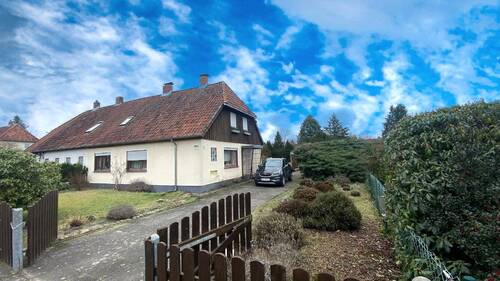 Bild 2 - 5 Zimmer Mehrfamilienhaus, Wohnhaus zum Kaufen in Faßberg