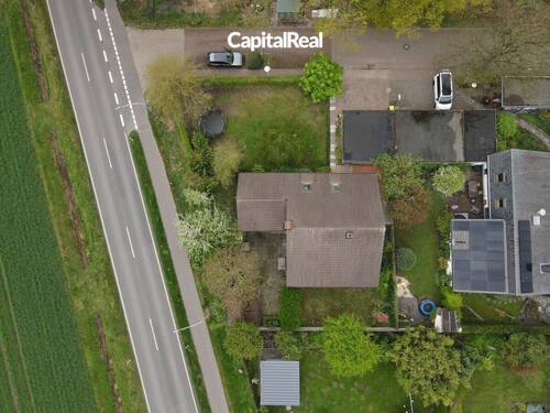 Titelbild - Idyllisches Einfamilienhaus mit großem Garten und Ausbaupotenzial in ruhiger Lage von Tungeln