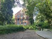 Hausseite mit TG-Zufahrt - 