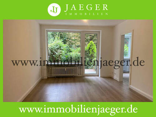 Wohnzimmer 1 - Wohnen im Grünen - Modernisierte Garten-Wohnung (EG) mit Terrasse - Duschbad- TG-Platz mögl.