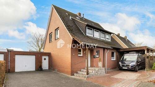 Außenansicht 2 - Charmantes Einfamilienhaus mit Einliegerwohnung, großem Garten & moderner Dämmung