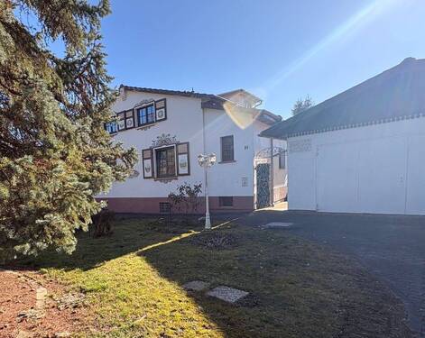 Ansicht - Charmantes Einfamilienhaus mit Entwicklungspotenzial in familienfreundlicher Lage