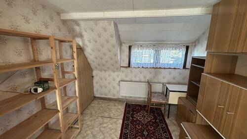 Zimmer im Dachgeschoss - 