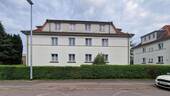 Straßenansicht - 3 Zimmer Etagenwohnung zum Kaufen in Zwenkau