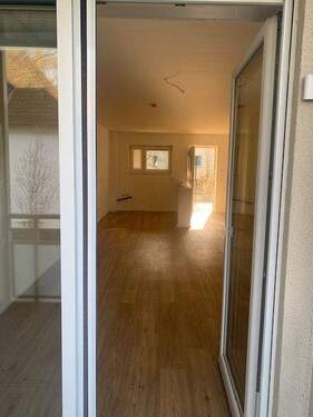 Blick von der Terrasse in die Wohnung.jpg - 