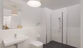 Modern gefliestes Badezimmer mit bodengleicher Dus - 