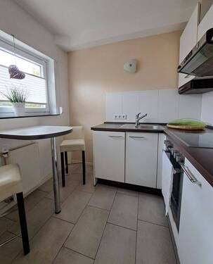 Küche mit gemütlichem Essplatz - 