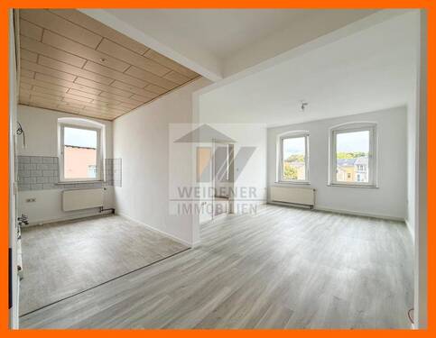 Wohnzimmer mit offener Küche - WOW! Modernisierte 3 Zimmer Wohnung im Ostviertel mit neuem Duschbad!