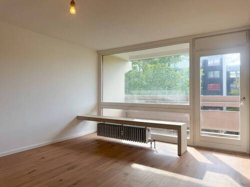 Wohnzimmer - 1 Zimmer Etagenwohnung zum Kaufen in München