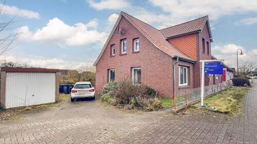 Seitenansicht - Großfamilien aufgepasst: Großzügiges Einfamilienhaus in Neubruchhausen