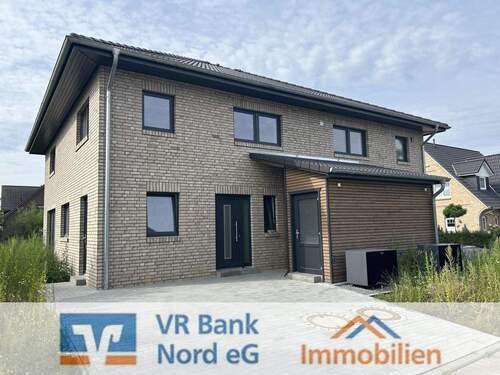 Bild 1 - Neubau - komfortable Doppelhaushälfte