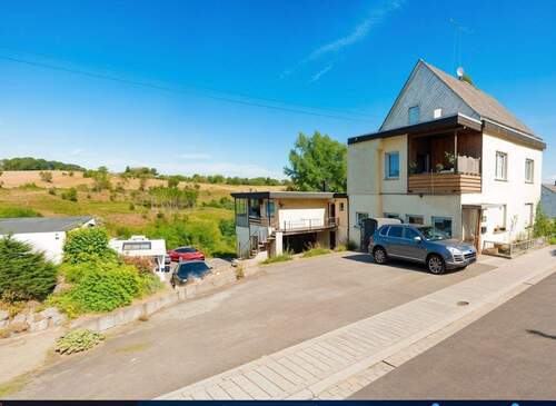 Aussenansicht - 2 Fam.-Haus + Werkstatt + Baugrundstück *Teil-Vermieten*