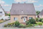 Außenansicht - Familientraum zum Wohlfühlen: Großzügiges Zweifamilienhaus in Versmold-Bockhorst