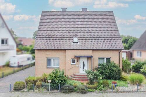 Außenansicht - Familientraum zum Wohlfühlen: Großzügiges Zweifamilienhaus in Versmold-Bockhorst