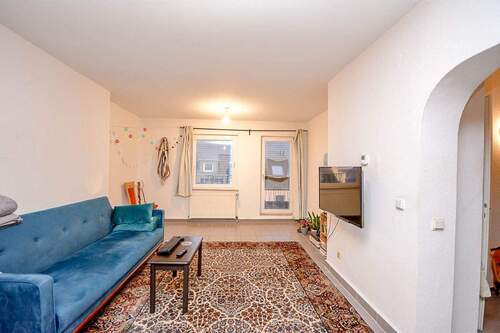 Wohnzimmer - Etagenwohnung mit 78,10 m&sup2; in Köln zum Kaufen