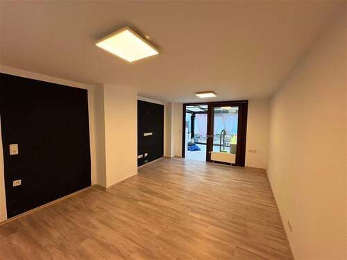 Wohnzimmer mit Wintergarten - 