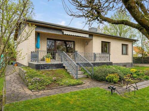 Titelbild - Investment mit Nießbrauch: Massives Einfamilienhaus, top gepflegt und ruhig gelegen, S-Bahn-Nähe