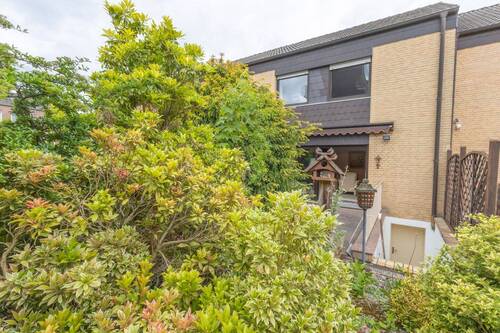 Haus & Gartenansicht - Reihenmittelhaus mit 98,10 m&sup2; in Menden zum Kaufen
