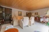 Wohnzimmer mit Zugang zur Terrasse - 
