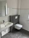 Badezimmer - Reihenendhaus mit 105,00 m² in Ostrhauderfehn zum Kaufen