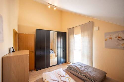 Schlafzimmer 1 / Haus 1 - 