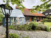 Exklusiver Gartenblick mit Wintergarten - Stilvolle Eleganz trifft Familienidylle - Exklusives Wohnen am Feldrand