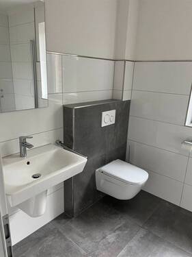 Badezimmer - Reihenmittelhaus mit 107,00 m² in Ostrhauderfehn zum Kaufen