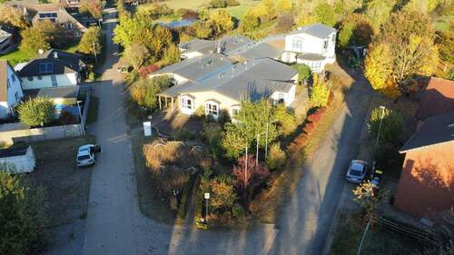Luftbild Eingangsbereich - Mehrfamilienhaus, Wohnhaus in Neustadt am Rübenberge zum Kaufen