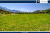 Titelfoto - Baugrundstück mit unverbautem Bergblick für ein Ein- oder Zweifamilienhaus