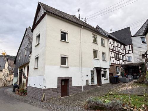Außenansicht - Gemütliches Reiheneckhaus in zentraler Ortslage
